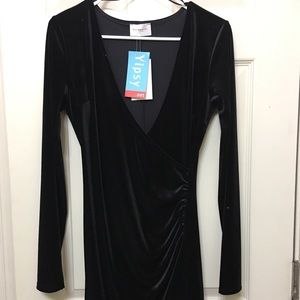 Long sleeve black velvet wrap dress.